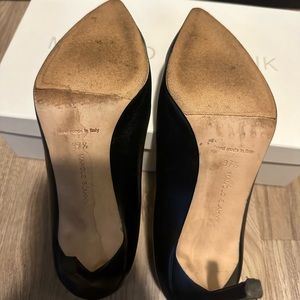Black leather Manolo Blahnik . Great for the office or even a night out .